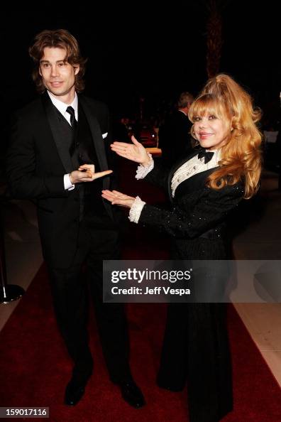 Charo Rasten Actor Charo and son Shel Rasten arrive at the 24th annual Palm... Photo ...