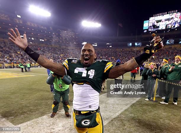 Safety Charles Woodson of the Green Bay Packers celebrates after the Packers 24-10 victory against the Minnesota Vikings in the NFC Wild Card Playoff...