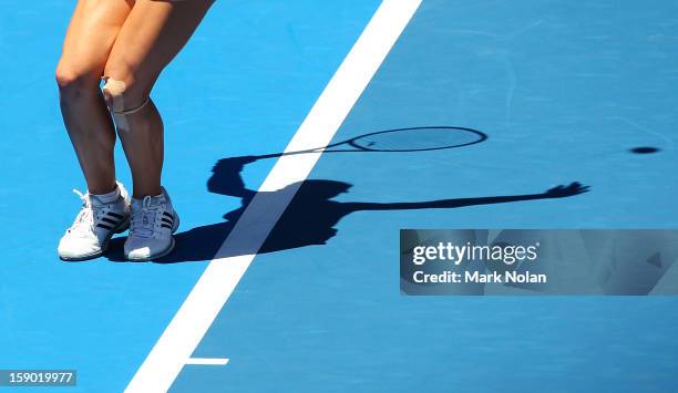 Maria Kirilenko of Russia serves in her first round match against Olivia Rogowska of Australia during day one of the Sydney International at Sydney...