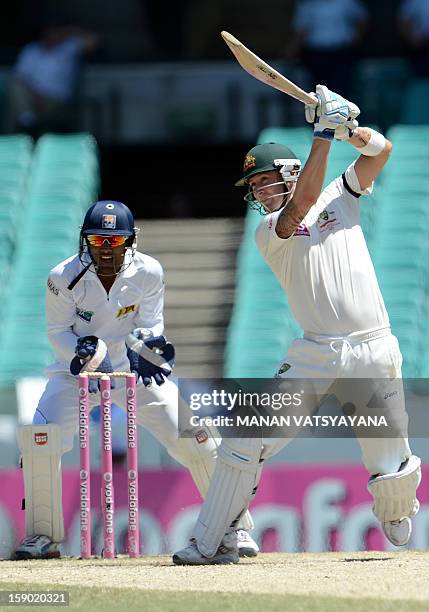 Australian cricket captain Michael Clarke plays a shot on the fourth day of the third cricket Test match between Australia and Sri Lanka at the...