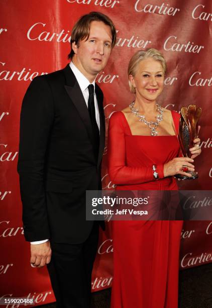 Director Tom Hooper and Dame Helen Mirren pose with the International Star Award at the 24th annual Palm Springs International Film Festival Awards...