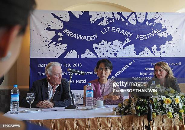 Myanmar democracy leader Aung San Suu Kyi answers a question during the media launch of the Irrawaddy Literary Festival at a hotel in Yangon on...