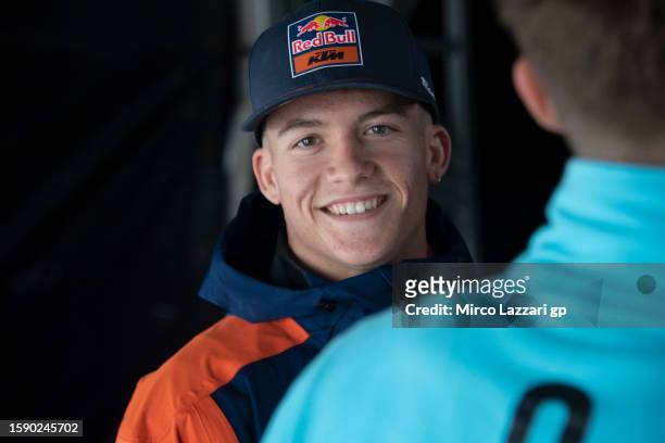Daniel Holgado of Spain and Red Bull KTM Tech3 smiles for fans during the "Two Wheels For Life" event in the paddock ahead of the MotoGP of Great...