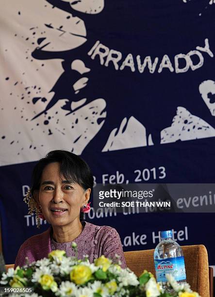 Myanmar democracy leader Aung San Suu Kyi speaks during the media launch of the Irrawaddy Literary Festival at a hotel in Yangon on January 6, 2013....
