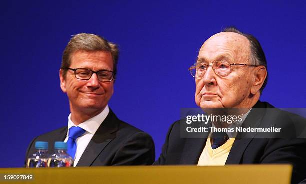 German Foreign Minister Guido Westerwelle and former German Foreign Minister Hans-Dietrich Genscher attend the annual Epiphany conference at the...