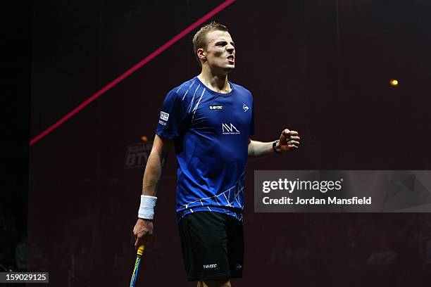 Nick Matthew of England celebrates after defeating Gregory Gaultier of France in the semi-final of the ATCO World Series Finals played at Queens Club...