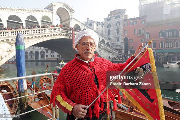 Agostino Conte dressed as 'Befana' wins the traditional Epiphany Boat Race on January 6, 2013 in Venice, Italy. In Italy, Epiphany is celebrated on...