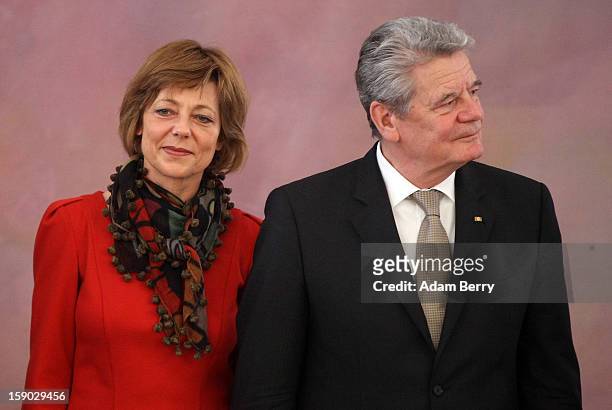German President Joachim Gauck and his partner, Daniela Schadt, listen to child Epiphany carolers, known as Sternsinger in German, at Bellevue...