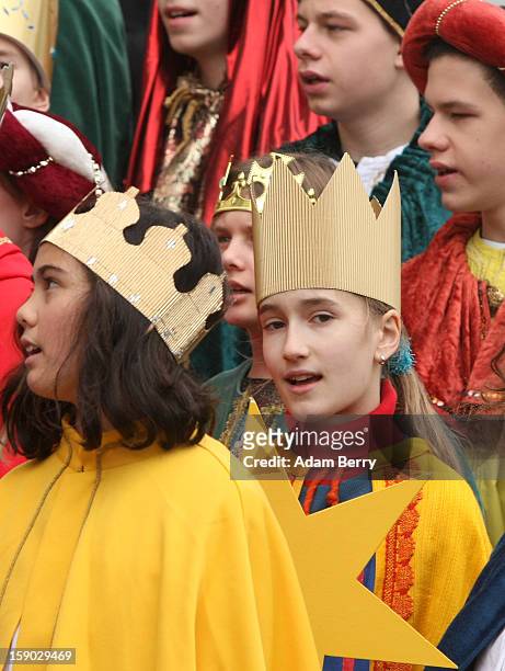 Child Epiphany carolers, known as Sternsinger in German, visit German President Joachim Gauck at Bellevue presidential palace on January 6, 2013 in...