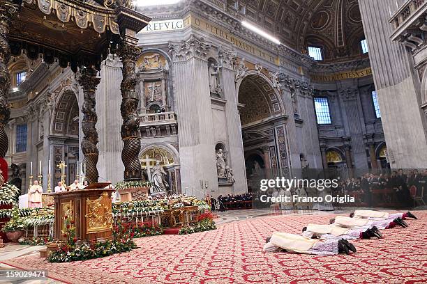 Four newly named bishops by Pope Benedict XVI attend the Epiphany Mass at the St. Peter's Basilica on January 6, 2013 in Vatican City, Vatican....