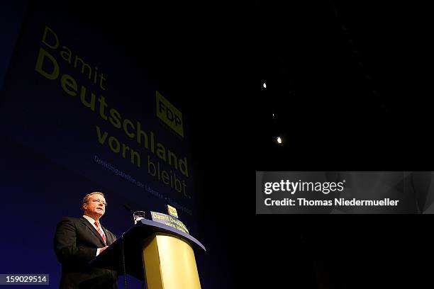 German Development Minister Dirk Niebel attends the annual Epiphany conference at the state opera house on January 6, 2013 in Stuttgart, Germany. The...