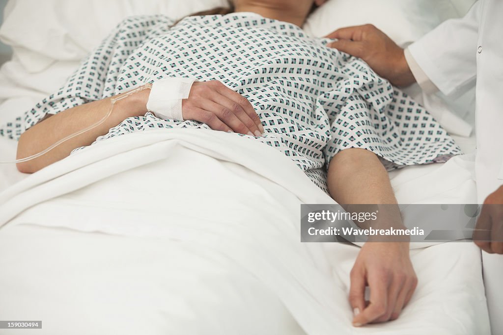 Old lady lying sick in bed