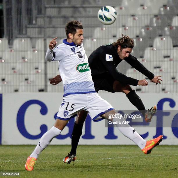 Bastia's Anthony Salis vies with Bastia's French defender Gaetan Varenne during the French Cup football match CA Bastia vs Sporting Club de Bastia at...