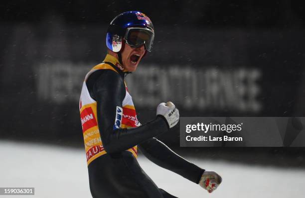 Gregor Schlierenzauer of Austria celebrates after the final round of the FIS Ski Jumping World Cup event of the 61st Four Hills ski jumping...