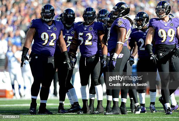 Haloti Ngata, Terrell Suggs, Ray Lewis, Ma'ake Kemoeatu and Paul Kruger of the Baltimore Ravens look on against the Indianapolis Colts during the AFC...