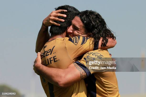 Martin Bravo of Pumas celebrates a goal against Atlas during a match between Pumas v Atlas as part of the Clausura 2013 Liga MX at Olimpico Stadium...