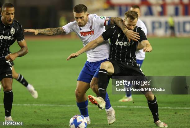 Marko Livaja of Hajduk Split and Tomasz Kedziora of PAOK in action during the UEFA Conference League Third Qualifying Round, 1st leg match between...