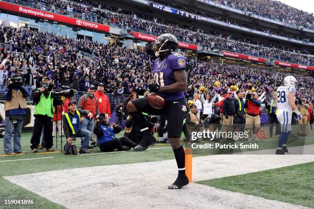 Anquan Boldin of the Baltimore Ravens celebrates after he scored an 18-yard touchdown reception in the fourth quarter against the Indianapolis Colts...