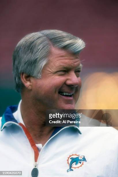 Head Coach Jimmy Johnson of the Miami Dolphins follows the action in the game between the Miami Dolphins vs the New York Jets at The Meadowlands on...
