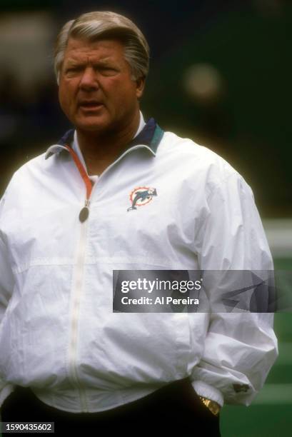 Head Coach Jimmy Johnson of the Miami Dolphins follows the action in the game between the Miami Dolphins vs the New York Jets at The Meadowlands on...