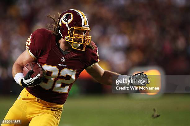 Logan Paulsen of the Washington Redskins carries the ball against the Seattle Seahawks during the NFC Wild Card Playoff Game at FedExField on January...