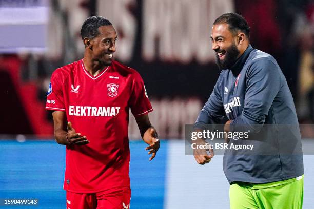 Joshua Brenet of FC Twente and Goalkeeper Issam El Maach of FC Twente celebrates his sides win during the Qualification Round Three Second Leg - UEFA...