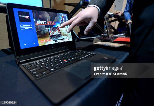 Lenovo introduces their new tablet/laptop Thinkpad Helix during the opening event ''CES Unveiled'' during the International Consumer Electronics Show...