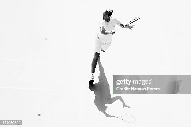 Xavier Malisse of Belgium plays a backhand during his first round match against Martin Kilzan of Slovakia during day one of the Heineken Open at ASB...