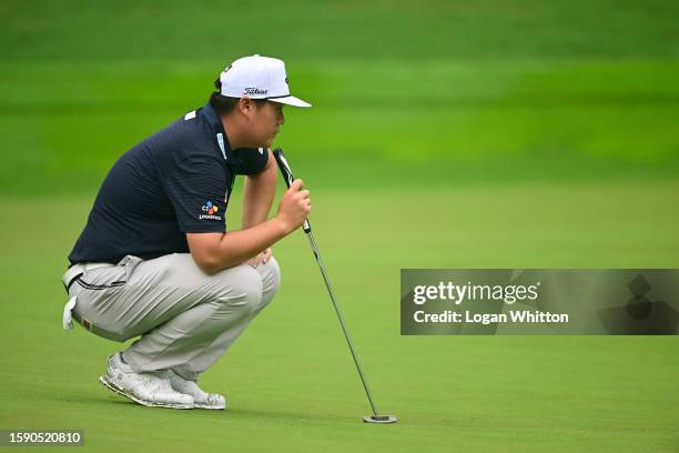 Sungjae Im of Korea lines up a putt on the 12th green during the first round of the Wyndham Championship at Sedgefield Country Club on August 03,...