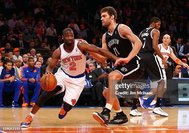 Raymond Felton of the New York Knicks in action against Brook Lopez of the Brooklyn Nets at Madison Square Garden on December 19, 2012 in New York...