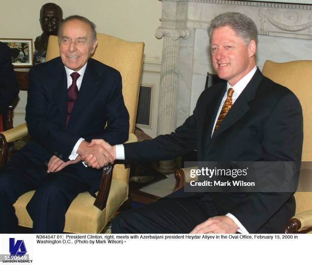 President Clinton, right, meets with Azerbaijani president Heydar Aliyev in the Oval Office, February 15, 2000 in Washington D.C..