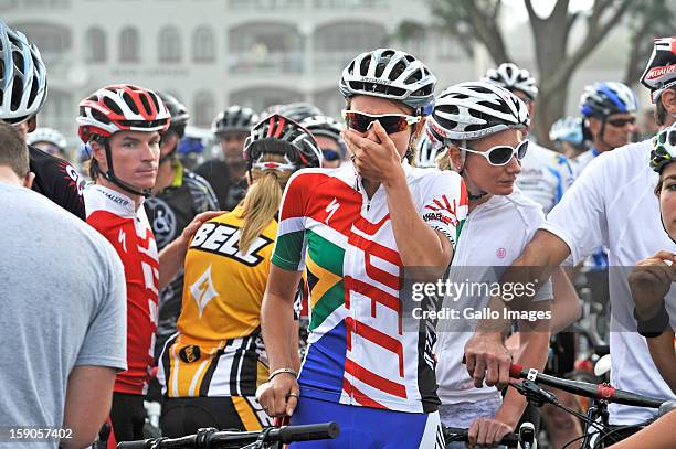 An emotional Cherise Stander, wife to the late Burry, starts the cyle to honour her husband on January 6, 2013 in Balito, South Africa. Burry was hit...