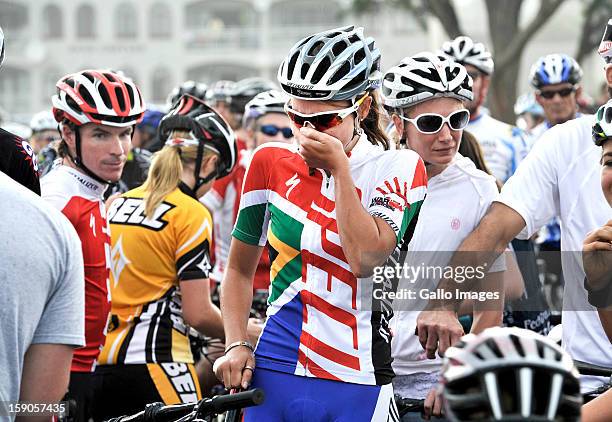 An emotional Cherise Stander, wife to the late Burry, starts the cyle to honour her husband on January 6, 2013 in Balito, South Africa. Burry was hit...