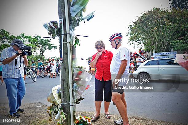 Charles Stander, Burry's father and his mother, Mandie Stander, comfort each other at the sight of the accident, where Burry Stander lost his life,...