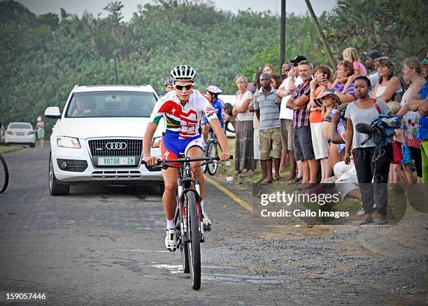 An emotional Cherise Stander, wife to the late Burry, starts the cycle to honour her husband on January 6, 2013 in Balito, South Africa. Burry was...