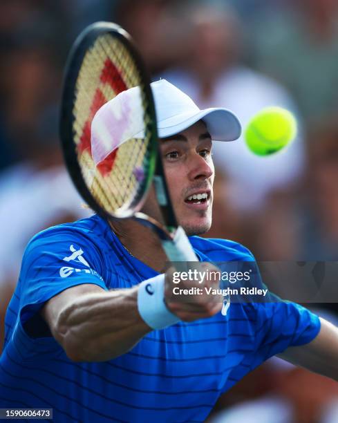 Alex De Minaur of Australia hits a shot against Taylor Fritz of the United States during Day Four of the National Bank Open, part of the Hologic ATP...