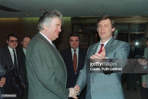Radovan Karadzic, Bosnian Serb warlord and leader of the Serb-run part of Bosnia during the 1992-1995 war, shakes hands with Russian Chairman of the...