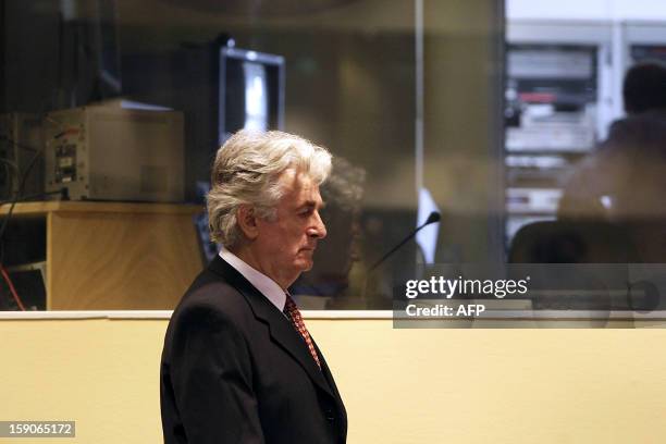 Bosnian Serb wartime leader Radovan Karadzic arrives in the UN's Yugoslav warcrimes court in The Hague on August 29, 2008 for his second appearance...