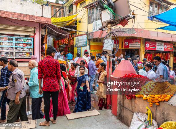 crowded street outside kamakhya mandir, guwahati, india - guwahati stock pictures, royalty-free photos & images