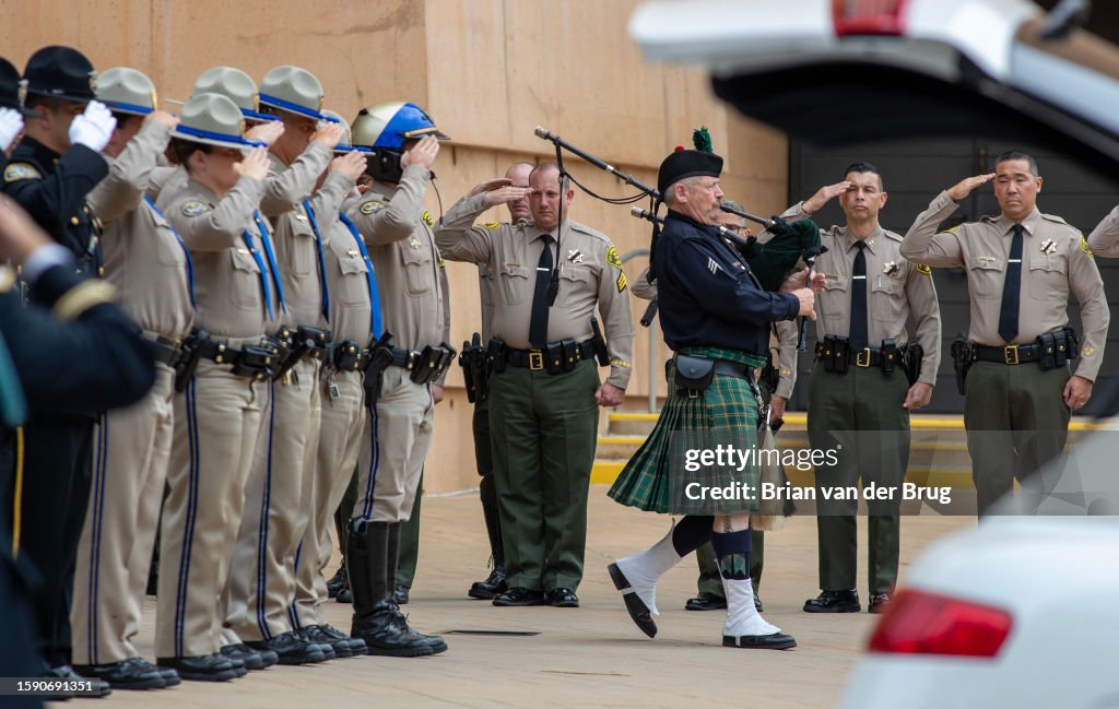 A bagpiper plays...