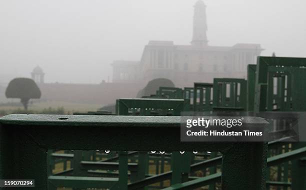 Dew forming on the barricades placed for Republic day parade near Raisana Hills on January 7, 2013 in New Delhi, India. Dense fog and icy winds...