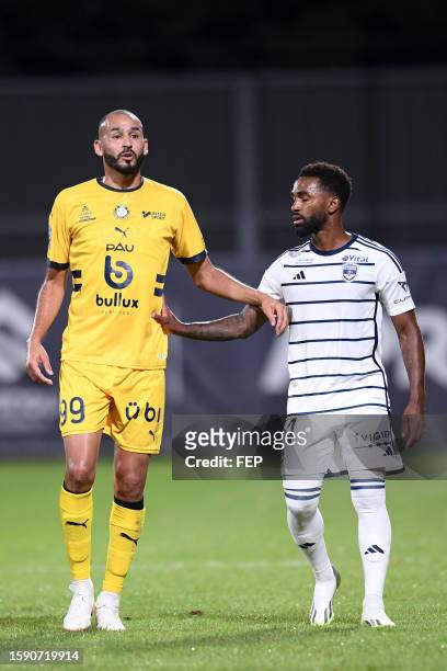 Khalid BOUTAIB - 14 Vital NSIMBA during the Ligue 2 BKT match between Pau and Girondins de Bordeaux at Stade du Hameau on August 7, 2023 in Pau,...