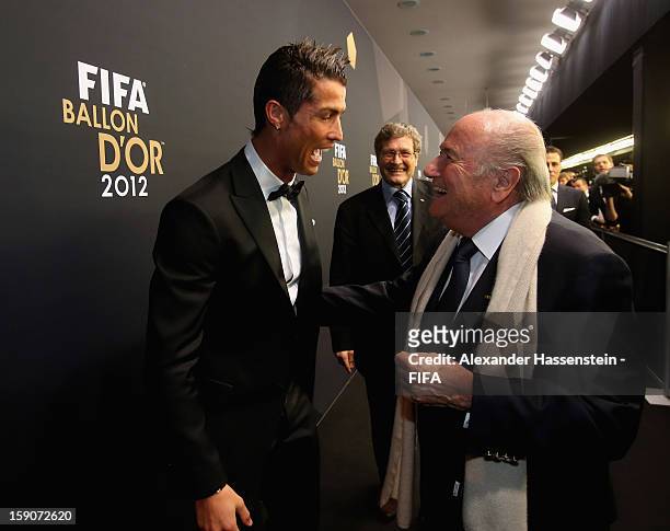 President Joseph S. Blatter greets Cristiano Ronaldo during the red carpet arrivals at the FIFA Ballon d'Or Gala 2012 at the Kongresshaus on January...