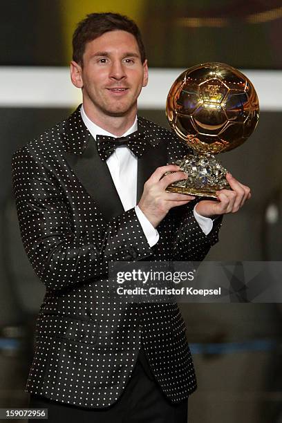 Lionel Messi of Argentina receives the FIFA Ballon d'Or 2012 trophy on January 7, 2013 in Zurich, Switzerland.