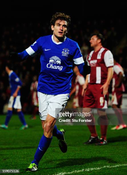 Nikica Jelavic of Everton celebrates as he scores their first goal during the FA Cup with Budweiser Third Round match between Cheltenham Town and...
