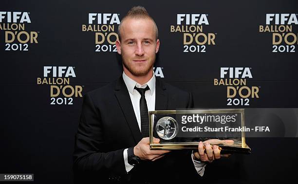 Miroslav Stoch of Slovakia poses with his trophy after winning the FIFA Puskas Award 2012 during the FIFA Ballon d'Or Gala 2012 at the Kongresshaus...