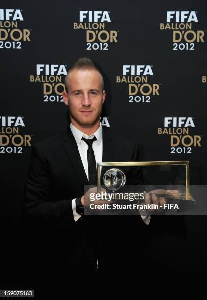Miroslav Stoch of Slovakia poses with his trophy after winning the FIFA Puskas Award 2012 during the FIFA Ballon d'Or Gala 2012 at the Kongresshaus...