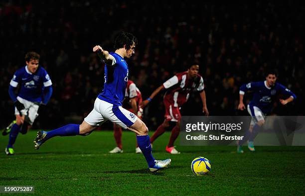 Leighton Baines of Everton scores their second goal from the penalty spot during the FA Cup with Budweiser Third Round match between Cheltenham Town...
