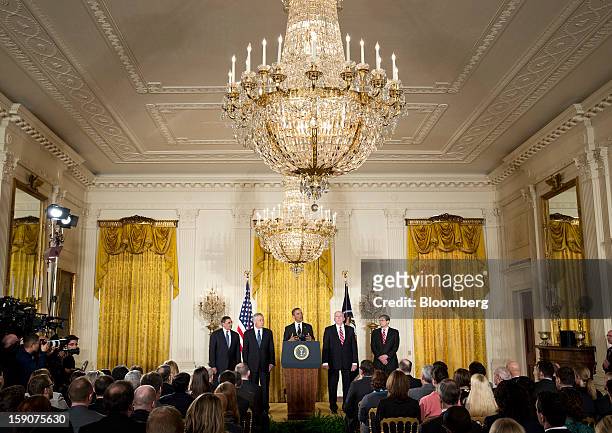 President Barack Obama, center, makes an announcement flanked by his nominee for Secretary of Defense Chuck Hagel, second left, a former Republican...