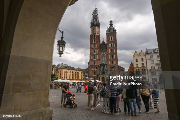 General view of the St. Mary's Basilica in Krakow's Market Square, on August 10 in Krakow, Lesser Poland Voivodeship, Poland. St Mary's Basilica's...